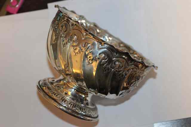 Appraisal: A SMALL SILVER BOWL with chased and engraved decoration and