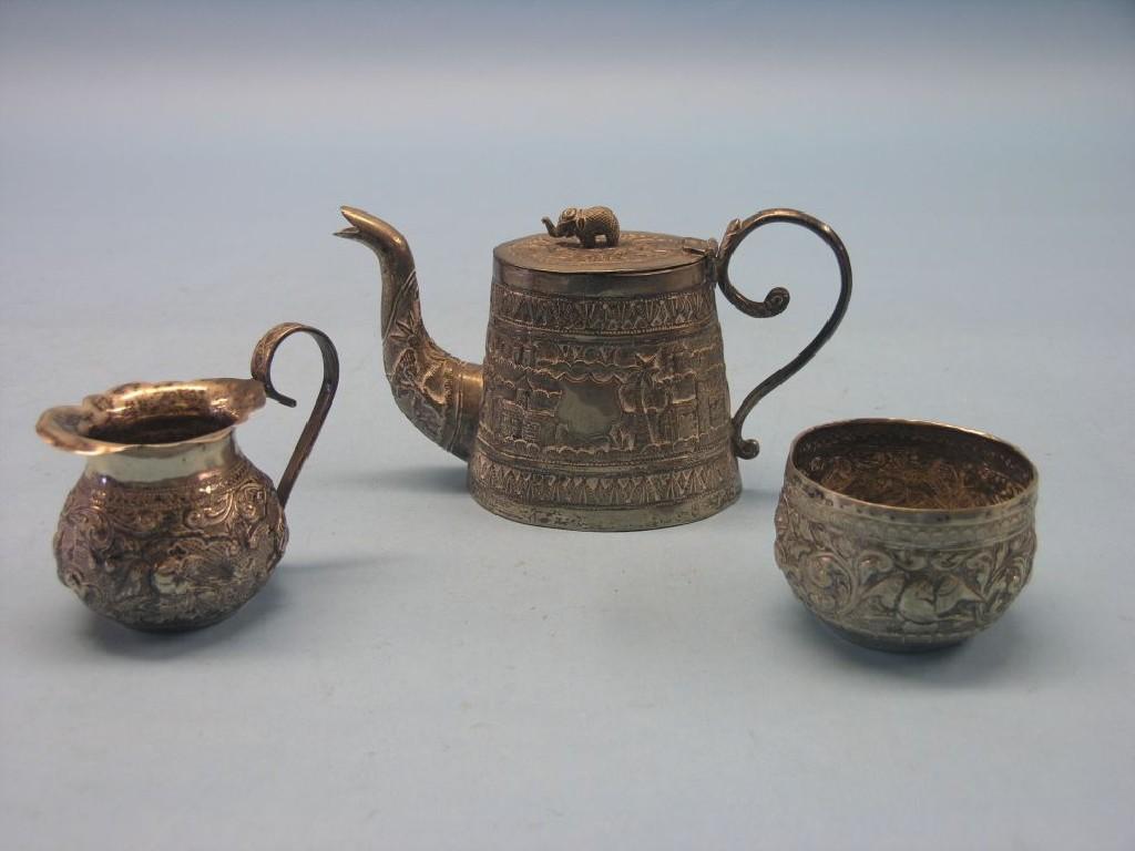 Appraisal: An Indian silver teaset teapot milk jug and sugar bowl