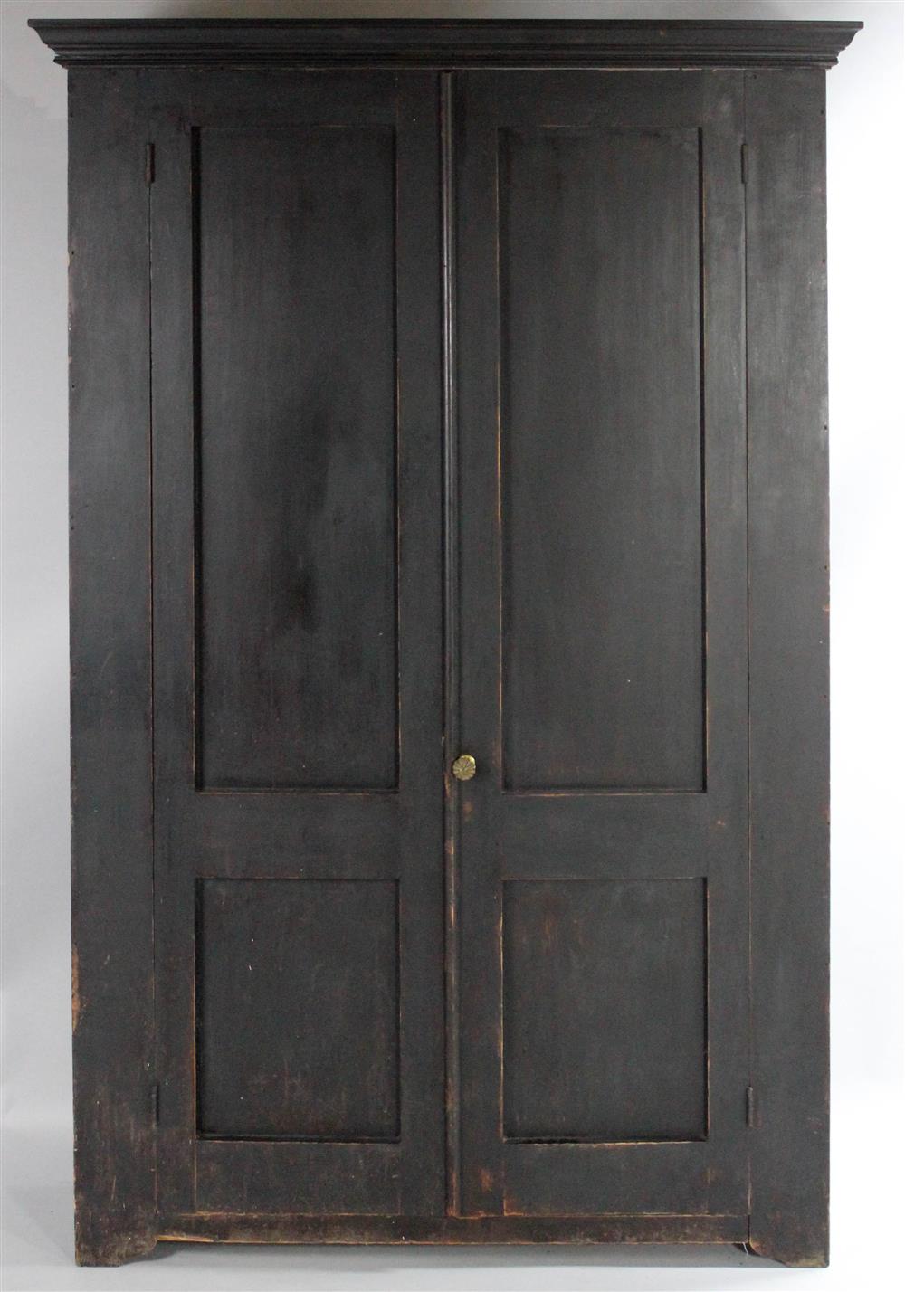 Appraisal: TALL VINTAGE BLACK PAINTED PINE ARMOIRE having a deep cornice