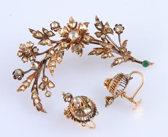 Appraisal: Base metal or low karat gold floral motif brooch X