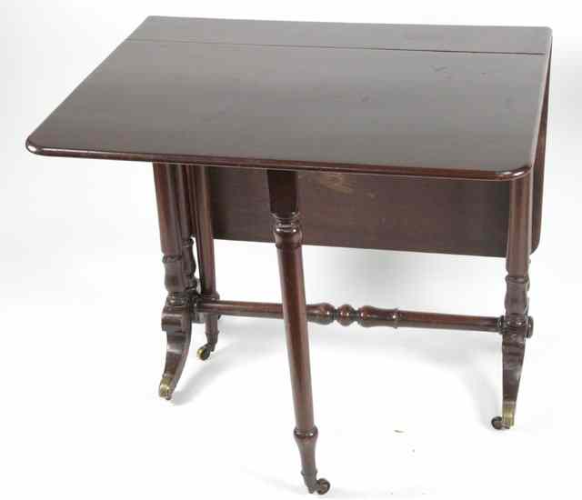 Appraisal: A Victorian mahogany Sutherland table circa with two flaps on