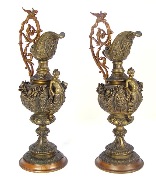 Appraisal: LARGE PAIR OF DECORATIVE VICTORIAN ORNATE BRONZE EWERS Ornate cast