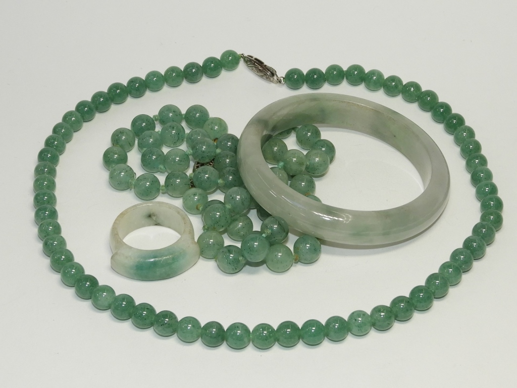 Appraisal: PC CHINESE CARVED JADEITE NECKLACE RING BRACELET China Early th