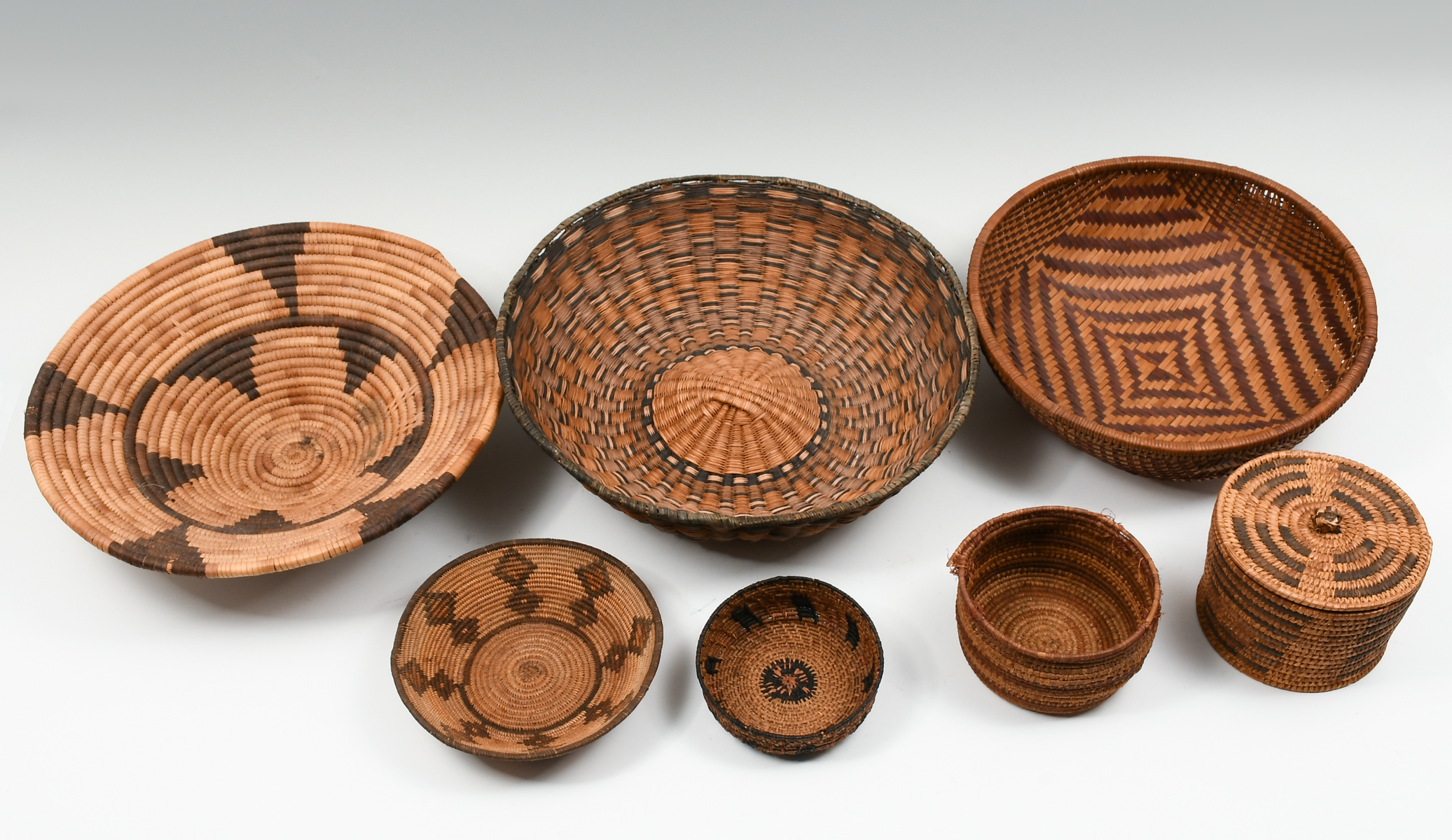 Appraisal: PC NATIVE AMERICAN WOVEN BASKETS Comprising - Baskets - Lidded