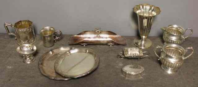 Appraisal: Miscellaneous Silver Lot Includes a sterling sugar and creamer marked