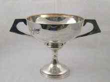 Appraisal: A large two handled silver trophy uninscribed cm across x