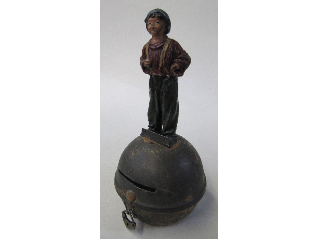 Appraisal: Painted metal boy figure bank