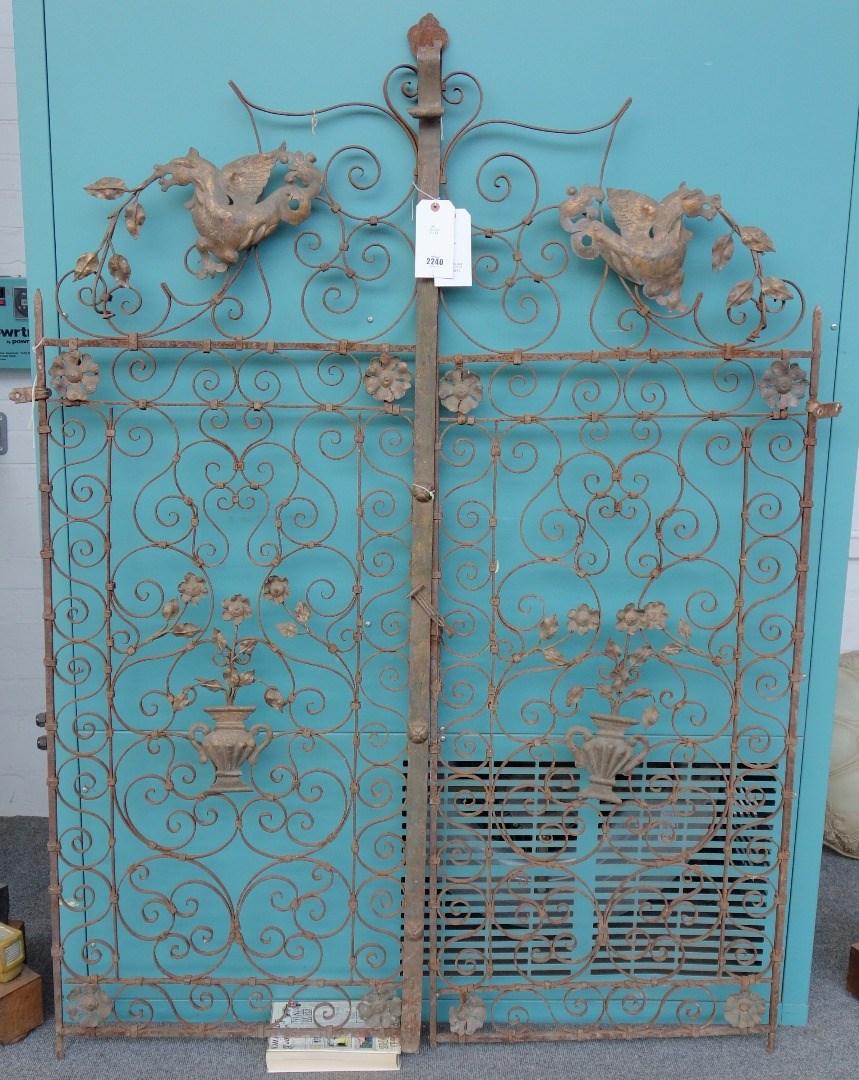 Appraisal: A pair of wrought iron gates late th century of