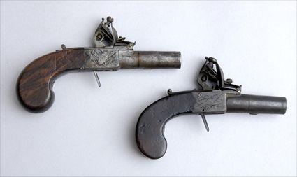 Appraisal: ASSEMBLED PAIR OF ENGLISH WALNUT AND STEEL SMALL FLINTLOCK PISTOLS