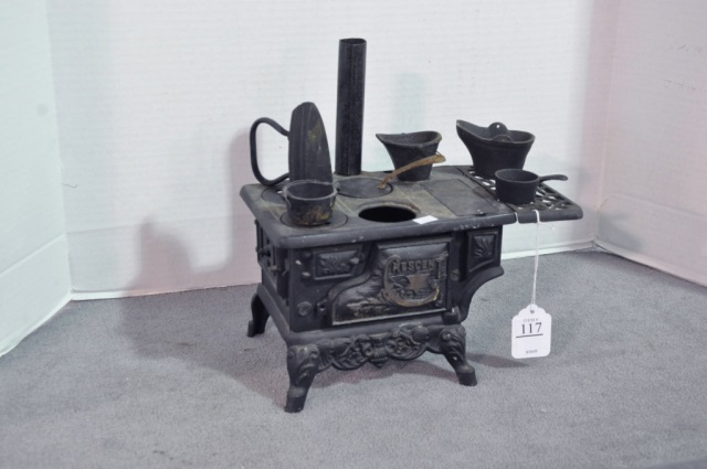 Appraisal: Vintage Crescent Childs Cast Iron Cook StoveWith stove pipe and