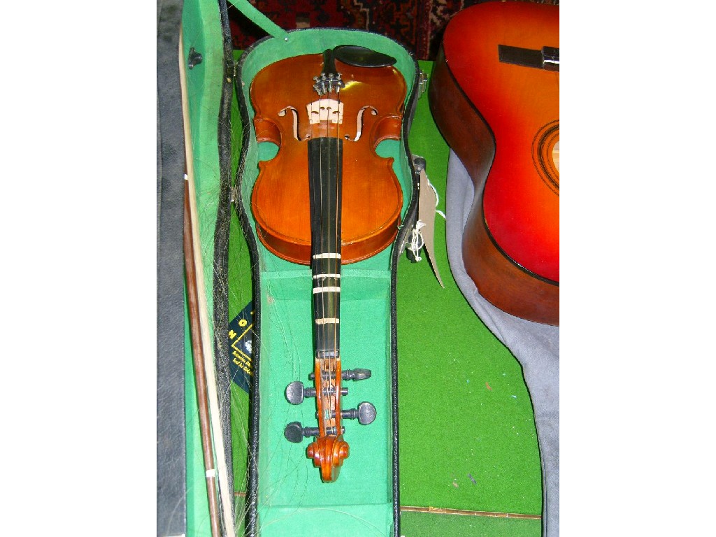 Appraisal: A cased violin with Chinese makers label to interior together