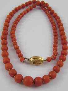 Appraisal: A graduated coral bead necklace the largest measuring approx mm