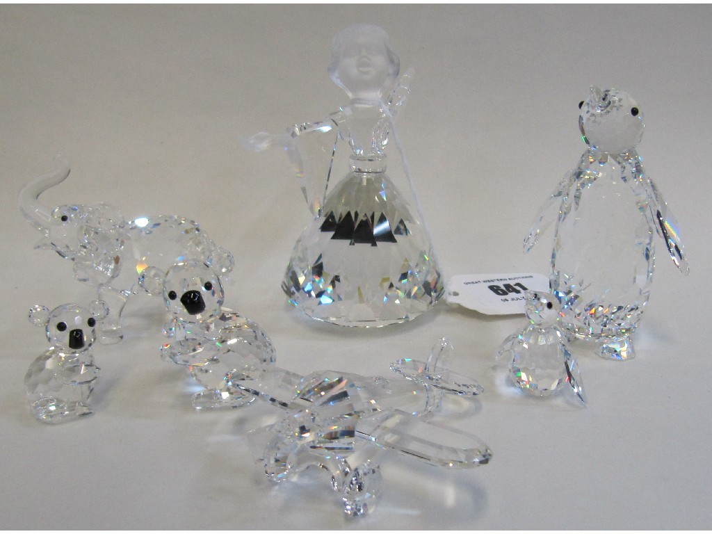 Appraisal: Seven Swarovski crystal ornaments to include koala bears penguins plane