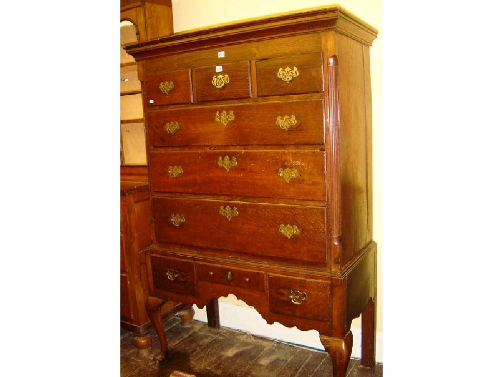 Appraisal: A Georgian oak chest on stand the chest fitted with