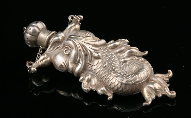 Appraisal: With dolphin shape design in Renaissance taste sprinkler form with