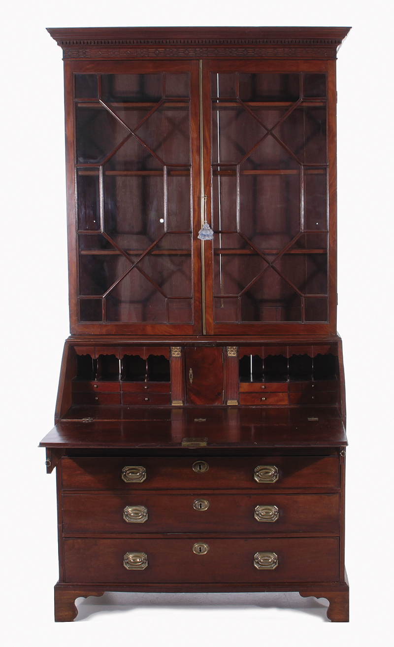 Appraisal: Georgian style mahogany secretary bookcase circa dentil and fret crown