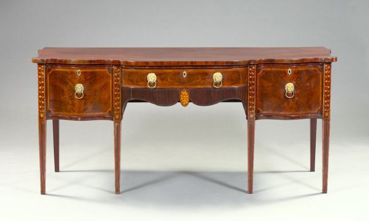 Appraisal: George III-Style Mahogany Sideboard early th century the shaped top