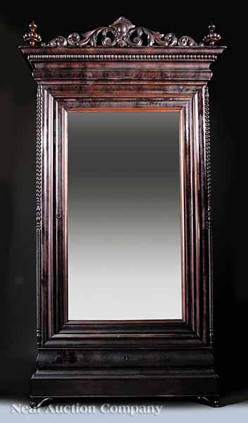 Appraisal: An American Rococo Carved Mahogany Armoire mid- th c New