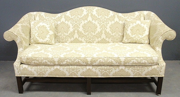 Appraisal: - Chippendale style mahogany camelback sofa with square molded legs