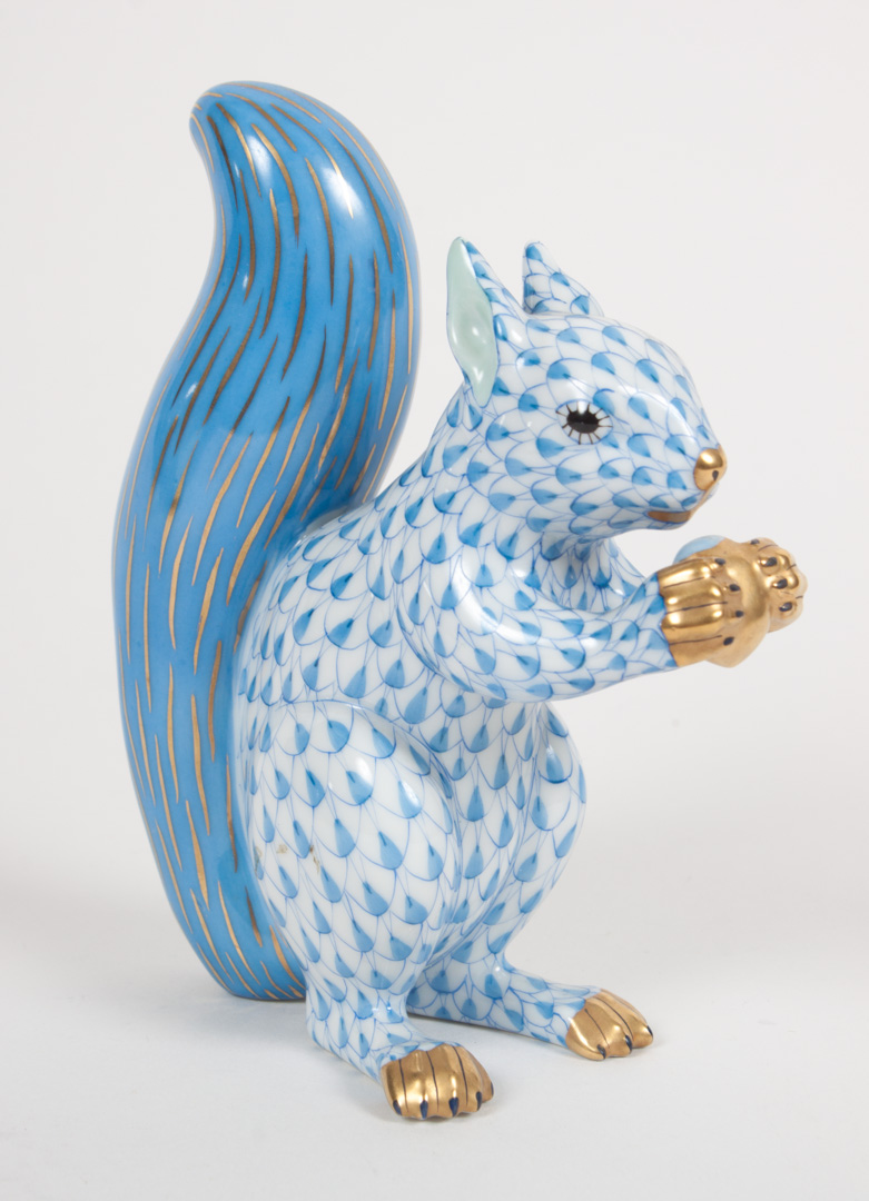 Appraisal: Herend porcelain squirrel blue fishnet pattern parcel-gilt in H