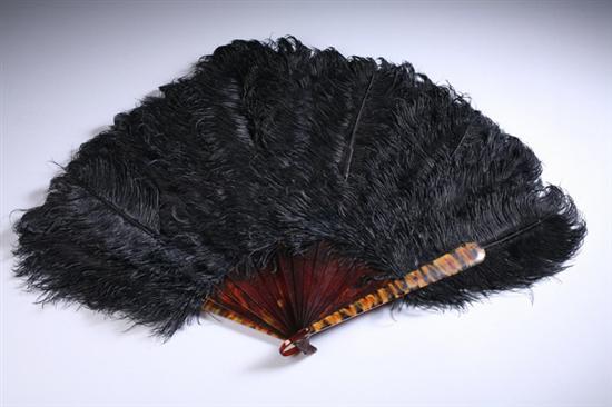 Appraisal: BLACK OSTRICH FEATHER FAN late th-early th century With tortoiseshell