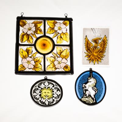 Appraisal: A square stained glass leaded panel with central bulls' eye