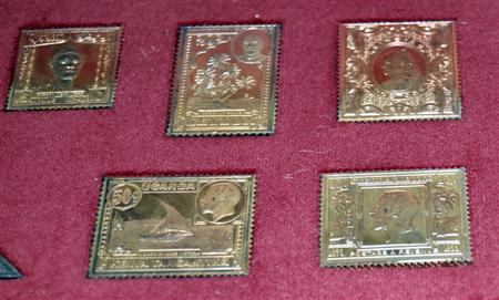 Appraisal: A set of silver gilt replica stamps comprising stamps of