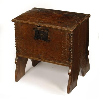 Appraisal: A small th century planked oak chest with castellated notchings