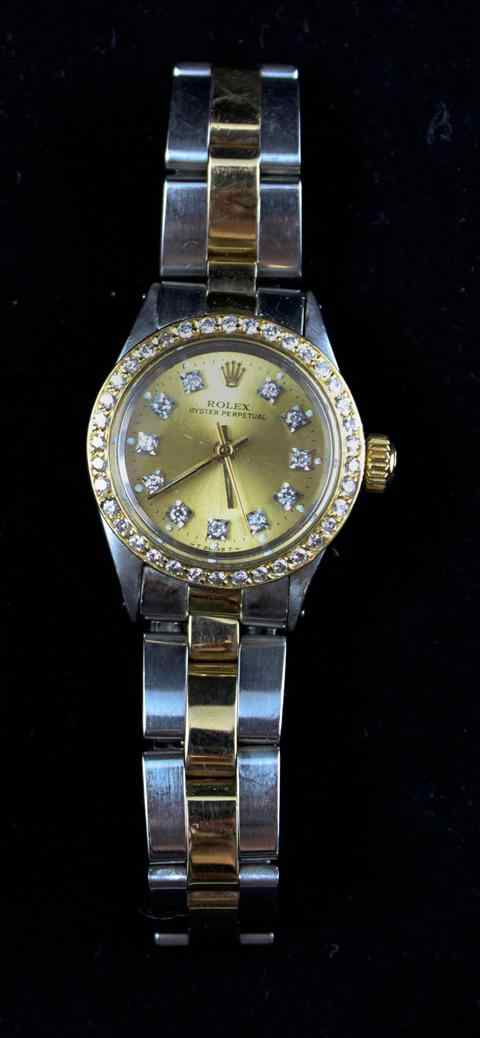 Appraisal: LADY'S ROLEX STAINLESS AND GOLD OYSTER PERPETUAL WATCH band marked