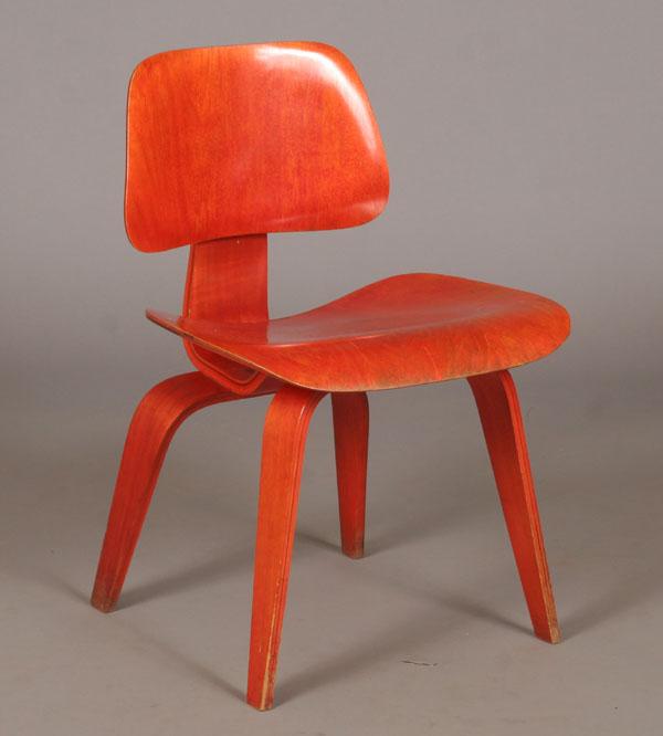 Appraisal: Charles Eames DCW red aniline dye dining chair wood for