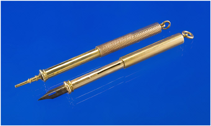 Appraisal: Two Gold Pen Pencil Combinations Pull out action with suspension