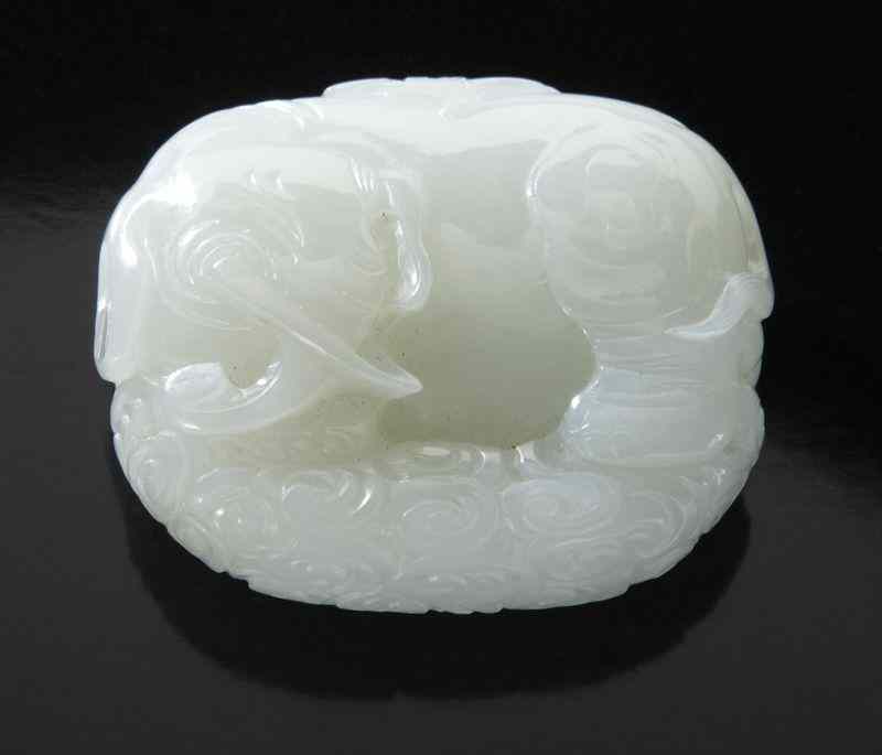 Appraisal: Chinese Qing Qianlong carved white jade elephantstanding in clouds ''H