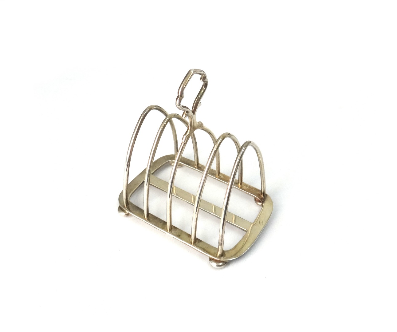 Appraisal: An Arts Crafts silver five bar toast rack Hukin Heath