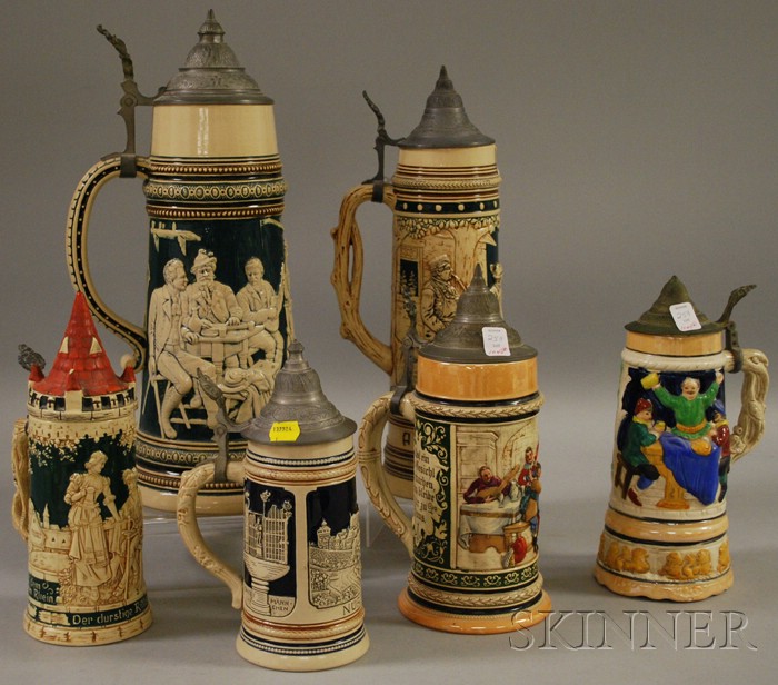 Appraisal: Five German Molded Stoneware Steins and a Japanese Musical Ceramic