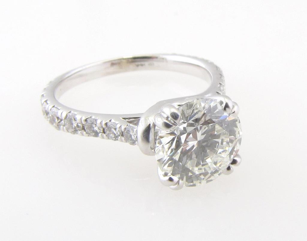 Appraisal: A K white gold ring with a CT round brilliant