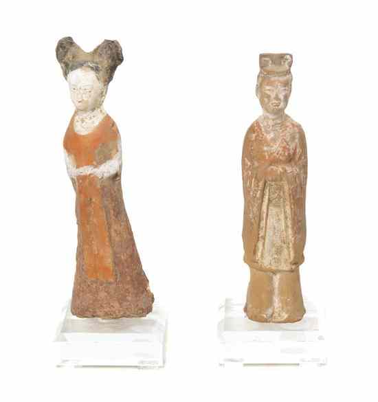 Appraisal: Two Chinese Pottery Tomb Figures one modeled after a Tang