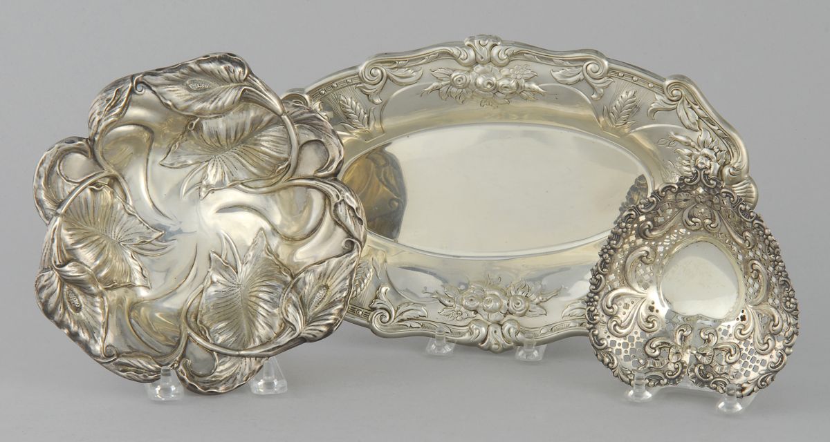 Appraisal: THREE STERLING SILVER DISHES Includes a bread tray by Michael