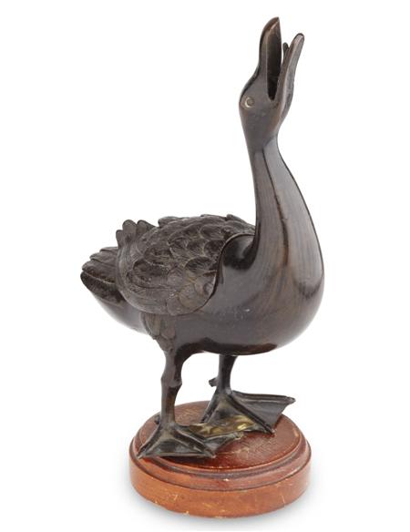 Appraisal: CHINESE BRONZE DUCK INCENSE BURNER MING DYNASTY standing with raised