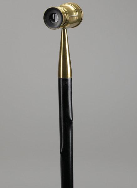 Appraisal: TELESCOPE CANE Adjustable brass telescope in ebonized shaft with bone