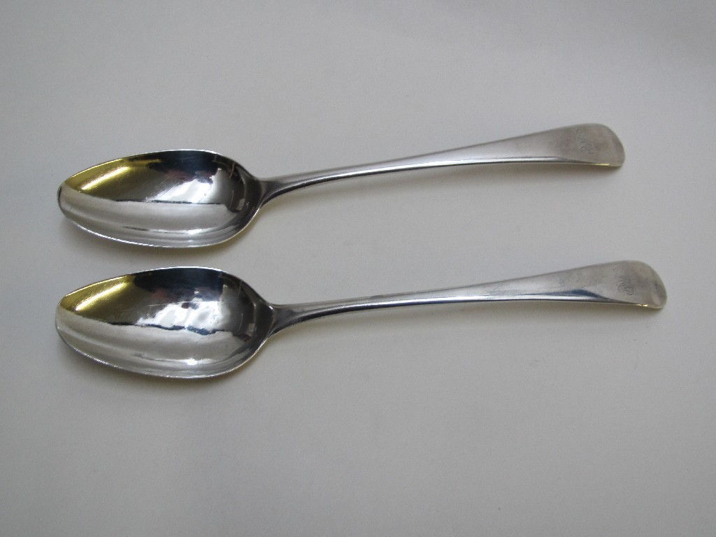 Appraisal: A pair of George III silver soup spoons engraved with