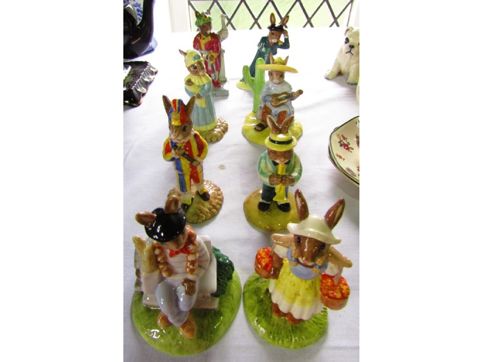 Appraisal: A collection of eight Royal Doulton Bunnykins figures Parisian DB