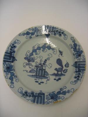 Appraisal: AN ENGLISH DELFT WARE CHARGER th century blue painted with