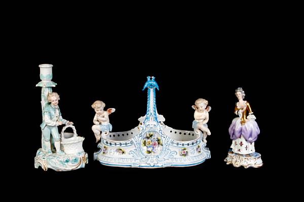 Appraisal: A group of German porcelain table articles comprising a floral-encrusted