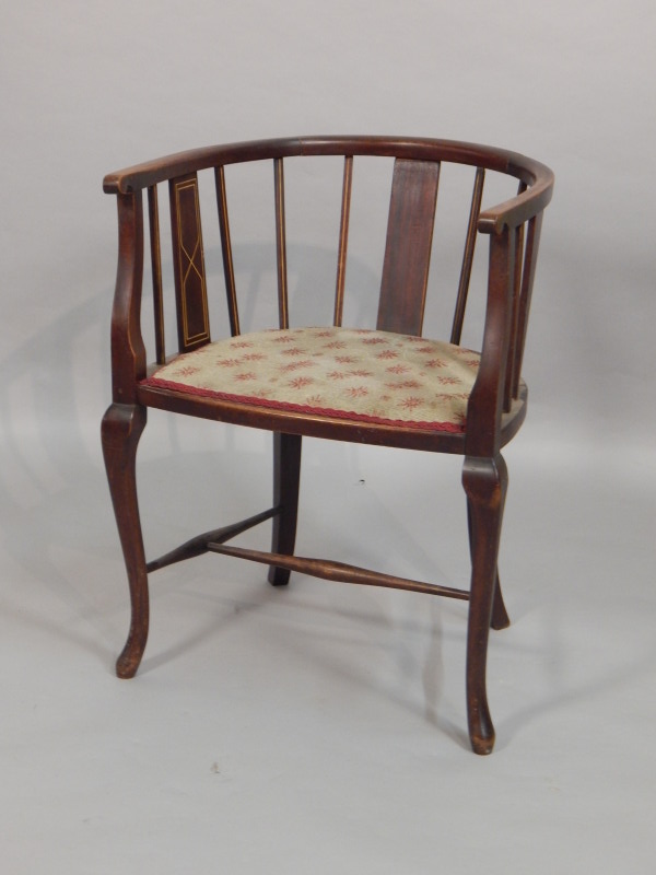 Appraisal: An Edwardian mahogany and boxwood strung tub chair with a