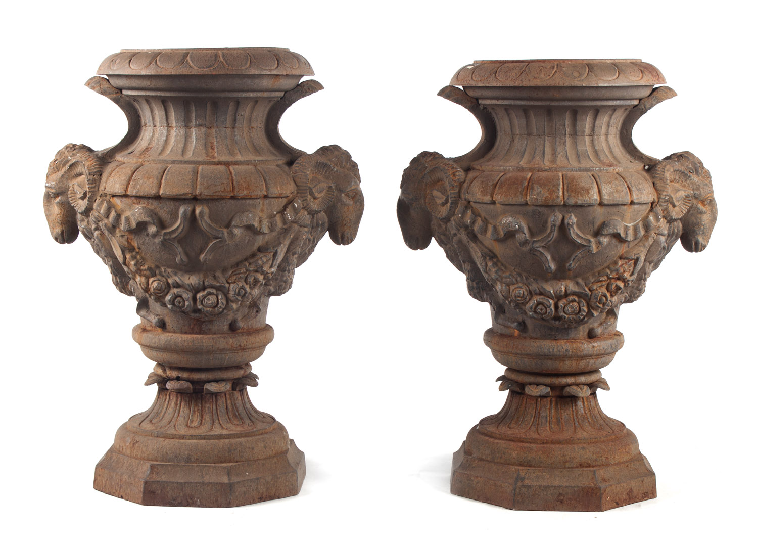 Appraisal: Pair Classical style cast iron garden urns with ram mask