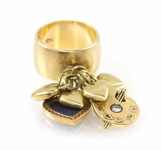 Appraisal: A Karat Yellow Gold Charm Ring consisting of a band