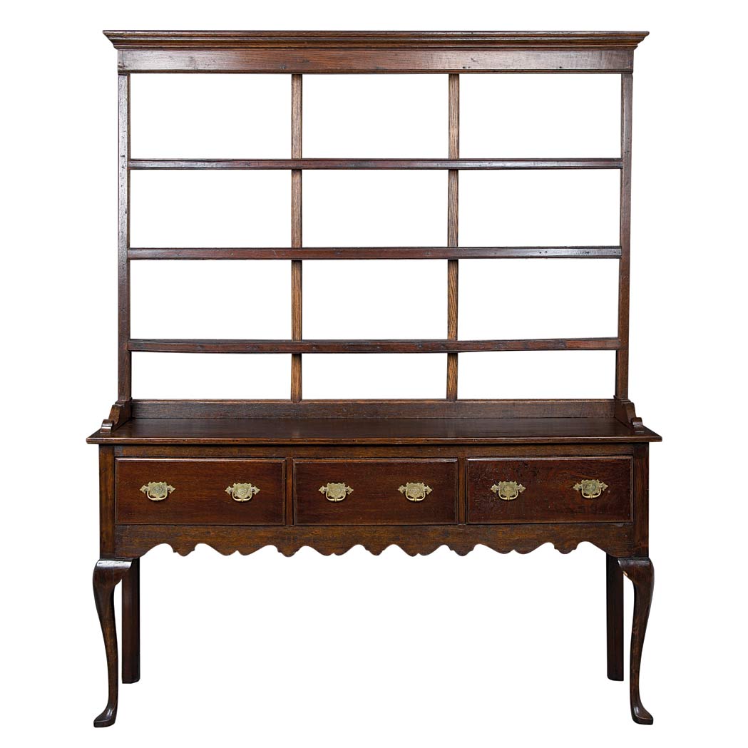 Appraisal: George II Oak Welsh Dresser The shelved open superstructure above