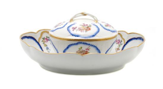 Appraisal: A Sevres Style Oval Bowl centered with a trophy together