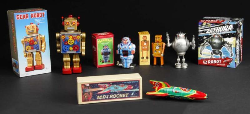 Appraisal: Lot of Tin Contemporary Robot Space Toys Description Consists of