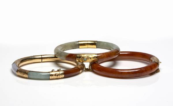 Appraisal: A group of five jade and gold bangles